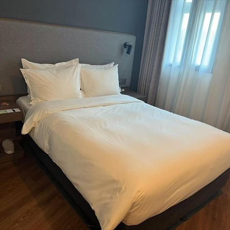 Holiday Inn Express Qingdao City Center, An Ihg Hotel Exteriör bild